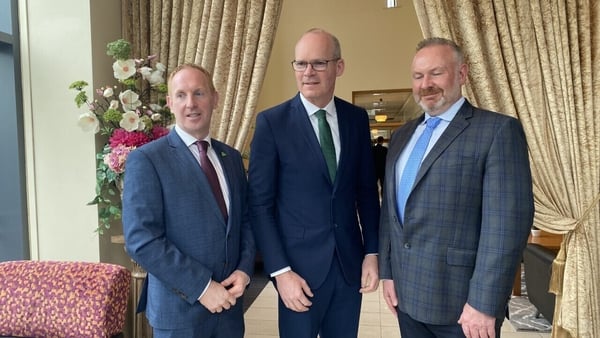 Chief Executive of IDA Ireland Michael Lohan (L) Minister Simon Coveney (M) and Dexcom Executive VP Global Operations Barry Regan (R)
