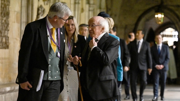 Michael D Higgins (right) arriving ahead of the coronation ceremony at Westminster Abbey