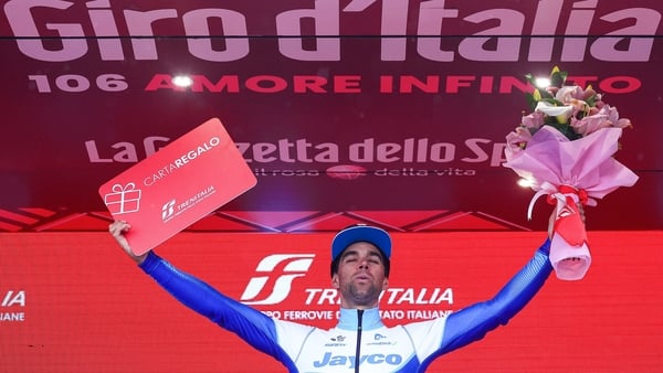 Michael Matthews celebrates on the podium