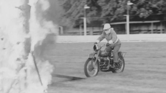 A member of the Cavalry Corps rides a motorcycle through a wall of fire at the military mini-tattoo at the Clonmel Showgrounds in County Tipperary, 1973.