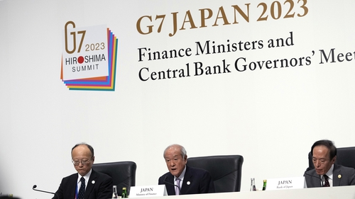 Shunichi Suzuki, Japan's finance minister (M), Kazuo Ueda, governor of the Bank of Japan (R) at a news conference during the G7 finance ministers and central bank governors meeting in Niigata, Japan