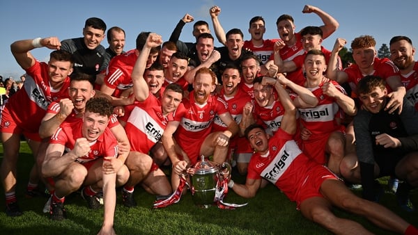Derry players celebrate with the Anglo Celt Cup