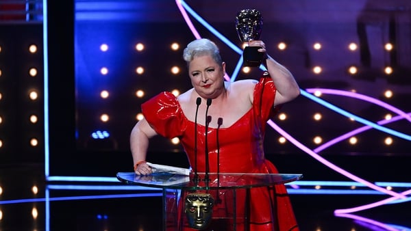 Siobhan McSweeney accepts her award at the Baftas