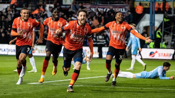 Tom Lockyer (centre) celebrates scoring Luton Town's second goal