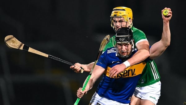 Tipp's Dan McCormack holds off Cathal O'Neill of Limerick during the counties' league clash in March