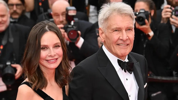 Harrison Ford and Calista Flockhart posed together on the red carpet. By Katie Wright.