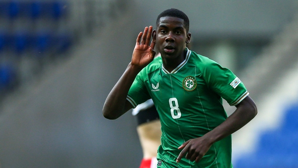 Romeo Akachukwu celebrates after scoring Ireland's third goal