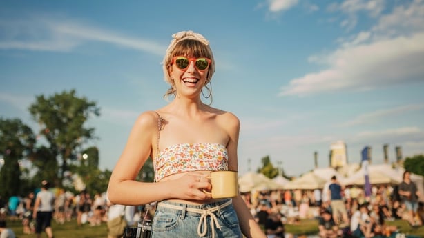 Young woman enjoys a warm summer day