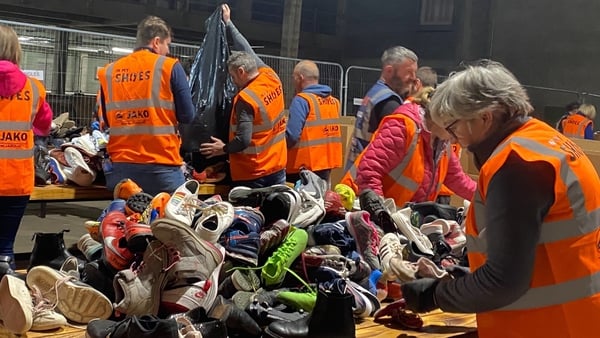 Volunteers in Sligo sorting out donated shoes