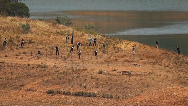 Portuguese authorities from the Judicial Police criminal investigation unit searching the Arade dam area