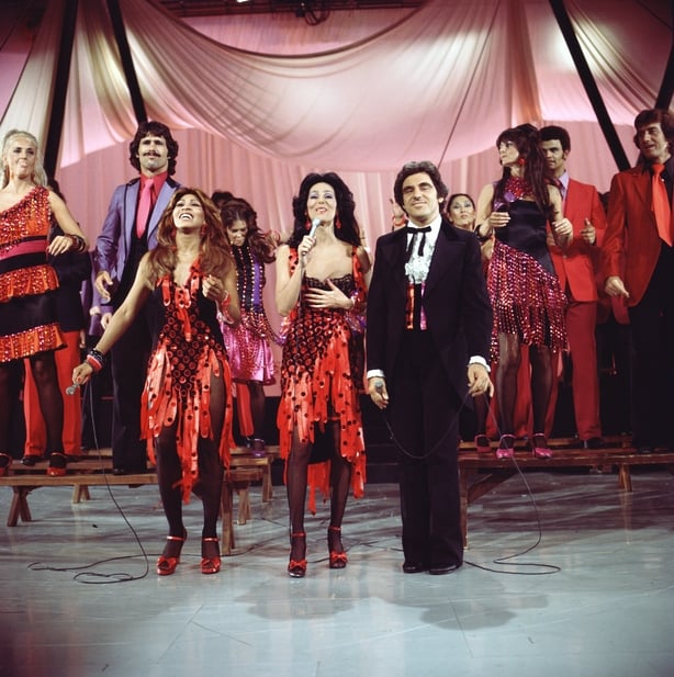 Tina Turner (left) and Cher, perform with British actor and singer Anthony Newley (1931 - 1999), and a large ensembled cast, on the television variety show 'The Sonny & Cher Comedy Hour,' 1972