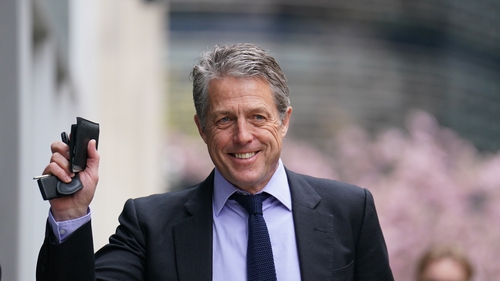 Hugh Grant: a damages claim brought by the actor against the publisher of The Sun will go ahead to a trial following a ruling by a High Court judge in London. Photo credit: James Manning/PA Wire