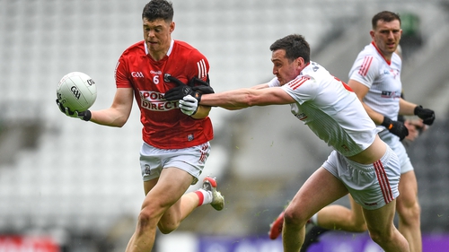 Cork's Rory Maguire in poossession against Louth's Tommy Durnin during last year's championship encounter