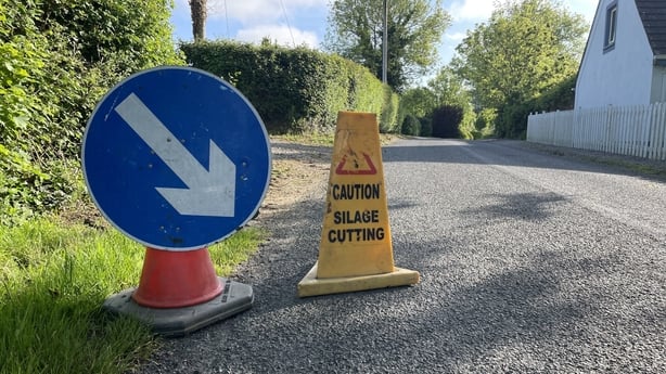 A silage warning sign on the road