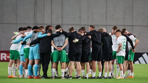 The Republic of Ireland team huddle after the defeat to Spain