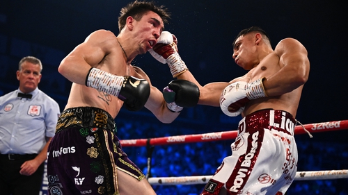 Luis Alberto Lopez, right, had too much power for Michael Conlan