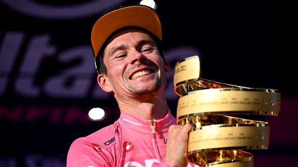 Giro winner Primoz Roglic celebrates on the podium