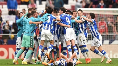 Real Sociedad players celebrate Champions League qualification