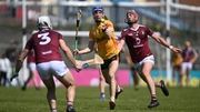 Antrim's James McNaughton comes under pressure from Westmeath's Conor Shaw, left, and Johnny Bermingham