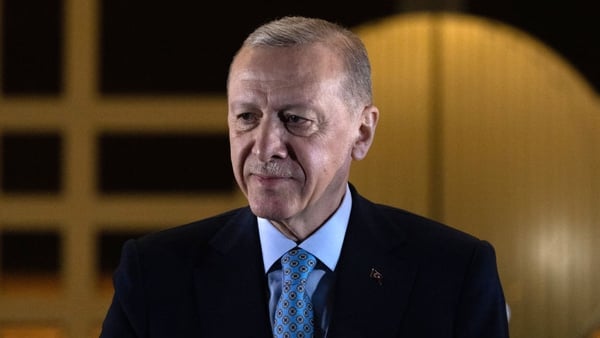 Near-complete results showed Recep Tayyip Erdogan beating secular opposition challenger Kemal Kilicdaroglu by 4%