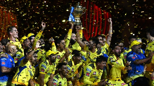 Chennai Super Kings' players celebrate with the trophy after their victory against Gujarat Titans