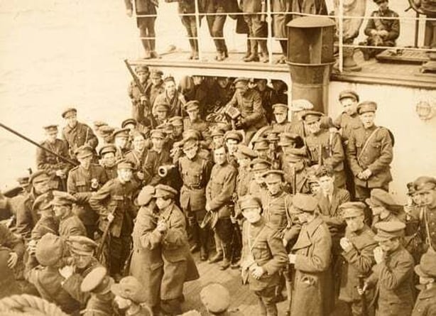 A moment of light relief for Free State soldiers on board the SS Arvonia in August 1922. There are still 49,000 soldiers in the National (Free State) army, General Mulcahy has disclosed. Photo: National Library of Ireland, HOG45