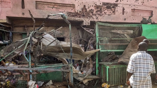 A medical centre building riddled with bullet holes in Khartoum