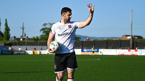 Patrick Hoban of Dundalk celebrates with the match ball