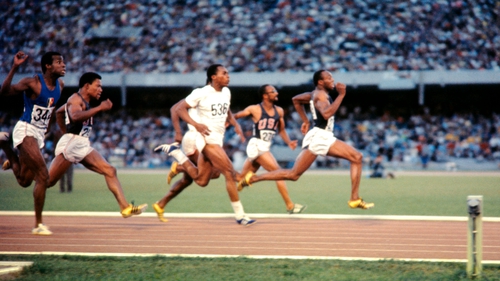 Jim Hines (R) on the way to breaking the 10-second barrier at the 1968 Olympics in Mexico