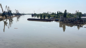 First consequences of the dam breach with flooding in Kherson's river port