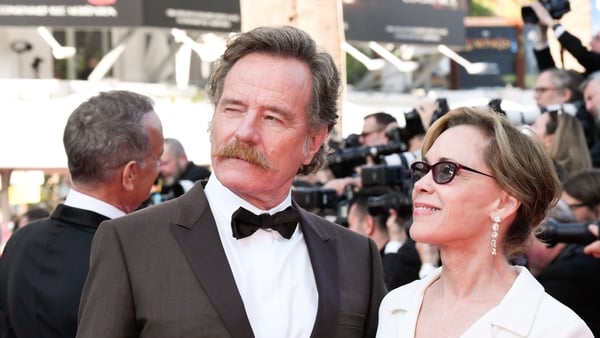 Bryan Cranston and Robin Dearden attend the Asteroid City red carpet during the 76th annual Cannes film festival at Palais des Festivals on May 23, 2023 in Cannes, France. (Photo by Stephane Cardinale - Corbis/Corbis via Getty Images)