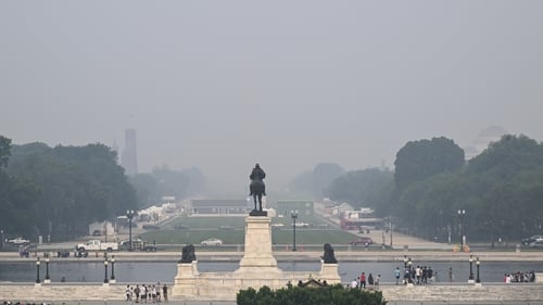 Thick skies and an acrid campfire smell have been hanging over the US capital