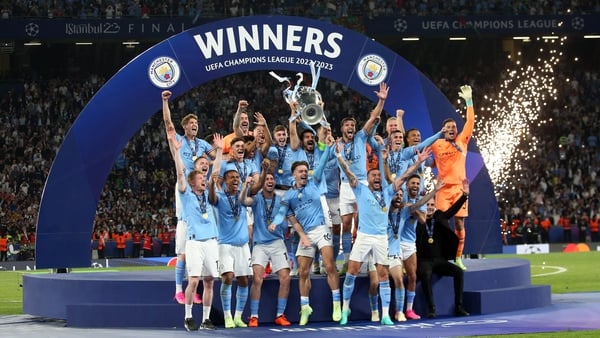 Manchester City players celebrate Champions League victory at the Ataturk Stadium