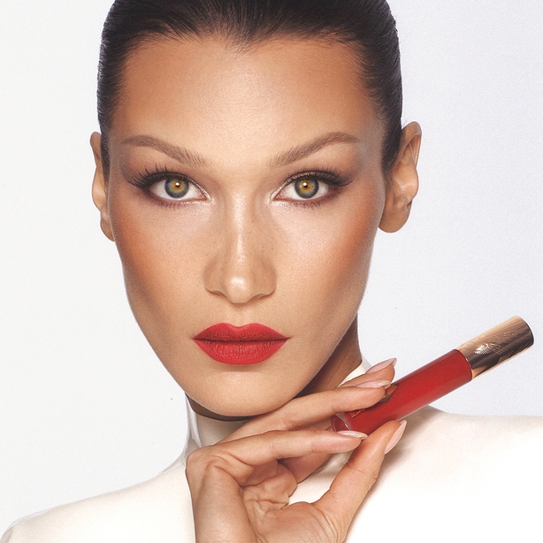 Bella Hadid wearing Charlotte Tilbury's new Airbrush Flawless Lip Blur in ruby blur shade (Charlotte Tilbury Beauty/PA)