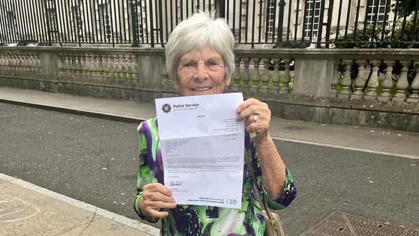 Betty Shivers, widow of Pat Shivers, one of the Hooded Men, holds a letter of apology from the PSNI outside Belfast High Court today. Photo: courtesy, Tony Shivers