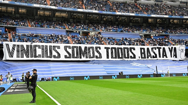 Real Madrid and Rayo fans display a banner reading 'We all are Vinicius. Enough (of racism)' after last month's incident