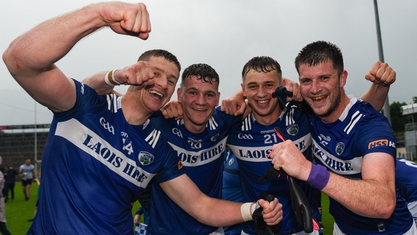 Laois players, from left, Evan O'Carroll, Kevin Swayne, Ciaran Burke and Brian Daly celebrate their win