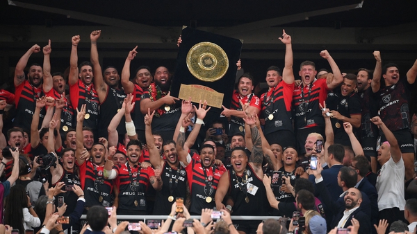 Toulouse players celebrate with the Bouclier de Brennus (Brennus Shield) at the Stade de France