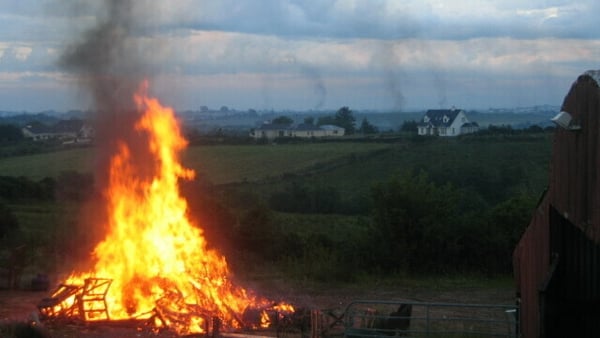A 2009 St John's Eve bonfire in Boradruma, Co Mayo with smoke from Castlebar bonfires in the background. Photo: National Museum of Ireland Facebook