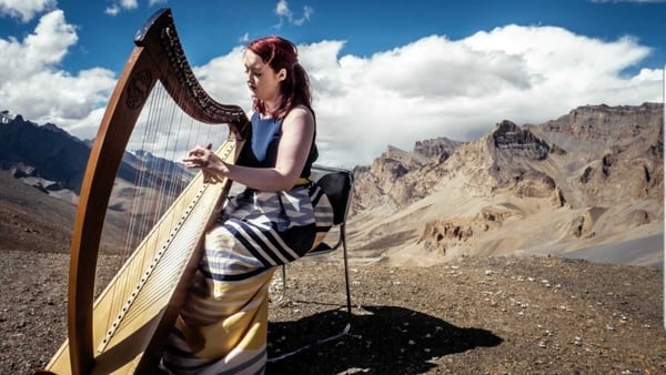Siobhán Brady playing the harp in the Himalayas 2018