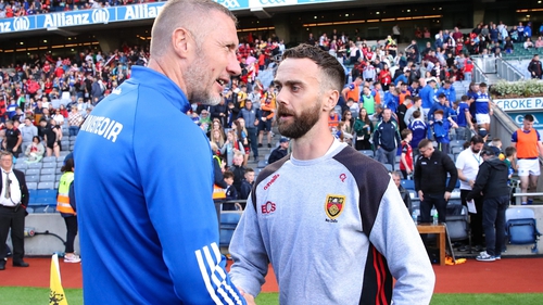 Conor Laverty (right) shakes hands with Billy Sheehan after the final whistle