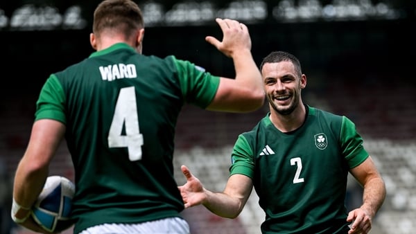 Zac Ward (left) and Andrew Smith (right) celebrate Ireland's third try in the semi-final win