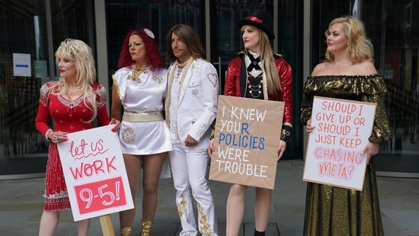 Celebrity impersonators banned from Facebook protest outside the offices of parent company Meta in King's Cross, London, as part of their 