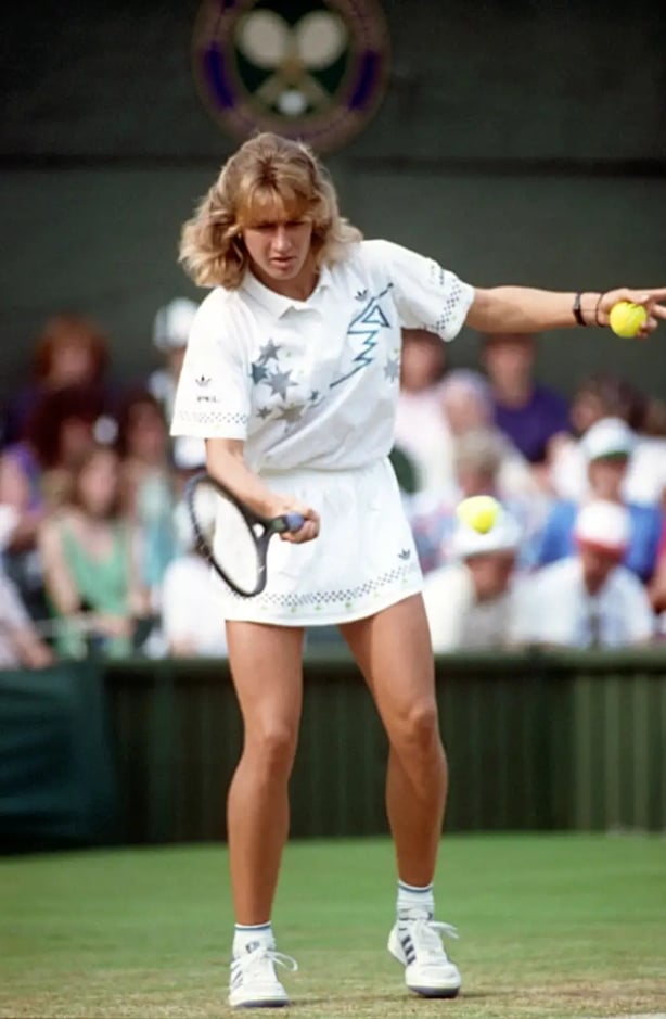 Steffi Graf playing at Wimbledon in 1988 (PA)