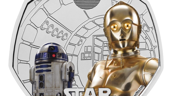 Royal Mint of the reverse of a Star Wars 50p coin which features robots C-3PO and R2-D2, as part of the four-coin collection, to mark the 40th anniversary of Star Wars: Return Of The Jedi