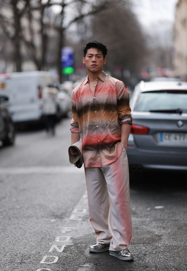 A fashion week guest seen wearing a total Paul Smith look before the Paul Smith