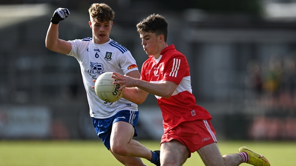 Johnny McGuckian of Derry in action against Tommy Mallen of Monaghan during the Ulster final at the end of May