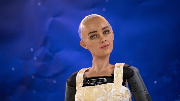 AI robot 'Sophia' is showcased during what was presented as the World's first press conference with a panel of AI-enabled humanoid social robots