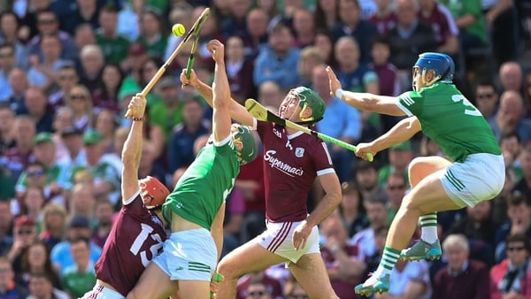 Sean Finn and Mike Casey (R) of Limerick compete for the ball against Conor Whelan (L) and Brian Concannon in last year's semi-final
