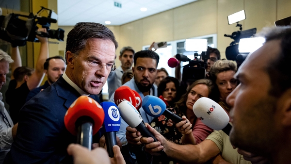 Mark Rutte speaks to the press after his statement on the fall of the coalition government on Friday